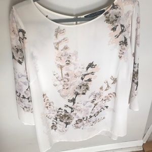 Blouse with small flowers designs.